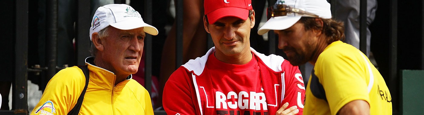MELBOURNE, AUSTRALIA - JANUARY 15:  Pat Rafter of Australia and Lleyton Hewitt of Australia talk between points in their first round men's doubles match against Eric Butorac of the United States and Raven Klassen of South Africa during day three of the 2014 Australian Open at Melbourne Park on January 15, 2014 in Melbourne, Australia.  (Photo by Scott Barbour/Getty Images)