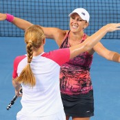 Anastasia Rodionova (R) and Russian partner Alla Kudryavtseva celebrate winning the Brisbane International title in 2014; Getty Images 