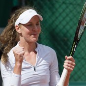 Olivia Rogowska celebrates her first-round qualifying victory at Roland Garros 2015; Elizabeth Xue-Bai