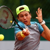 Akira Santillan in action during the junior event at Roland Garros 2014; Getty Images