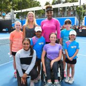 Amber Marshall (back row, left of Serena Williams) and Annerly Poulos (front left) at Australian Open 2019.