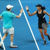 John-Patrick Smith (L) and Astra Sharma in action in the Australian Open mixed doubles semifinals (Getty Images)