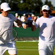 John-Patrick Smith (L) and Matt Reid in action in the men's doubles at Wimbledon; Getty Images