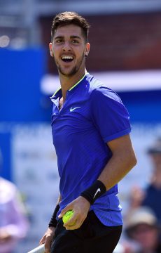 Thanasi Kokkinakis celebrates his first-round victory at Queen's Club in 2017 over Milos Raonic; Getty Images