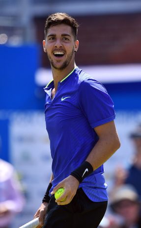 Thanasi Kokkinakis celebrates his first-round victory at Queen's Club in 2017 over Milos Raonic; Getty Images