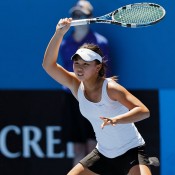 Olivia Tjandramulia in action in the girls' 18/u Australian Championships at Melbourne Park; Matt Johnson