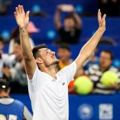 Bernard Tomic celebrates his victory at the ATP tournament in Chengdu, China; Getty Images