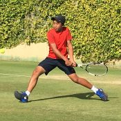 Edward Vo in action at the Australian Grasscourt Championships in Adelaide; Tennis SA