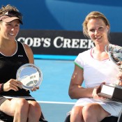 Daniela Di Toro and Esther Vergeer with their Australian Open trophies.